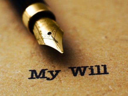 Image of a gold nibbed fountain pen on a piece of brown paper with the words 'my Will' printed