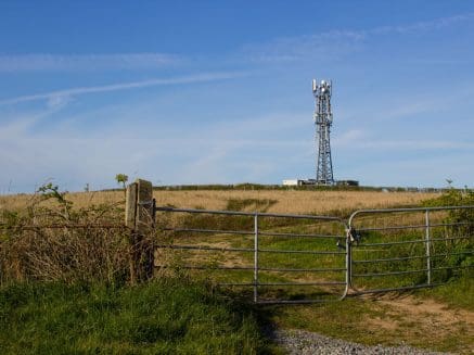 image of a mobile phone mast in a field